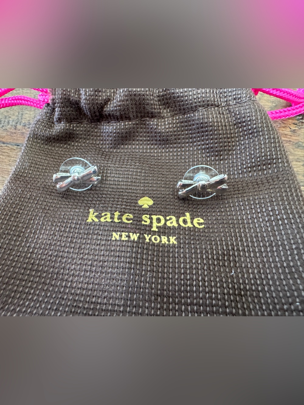 Authentic Kate Spade Bow Stud Earrings and dust bag.
